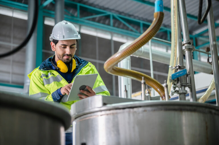 professional inspection control scientist in uniform are working for fruit juice production