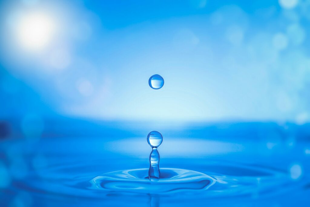 Water drop splash on water surface