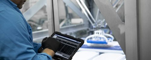 employees monitors robobatcher performance