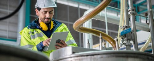 professional inspection control scientist in uniform are working for fruit juice production