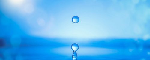 Water drop splash on water surface